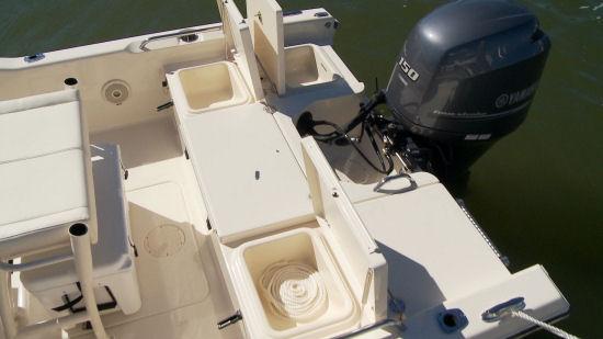 Things get lost when the boat starts bouncing around, plus it also allows for clever storage of the batteries and other