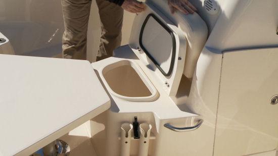 At the bow, the forward console seat comes standard with a 70-quart (66 L) cooler underneath that can be swapped out for a 17.5-gallon (66) livewell.