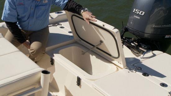 Under the forward console seat, owners can go with a standard cooler or opt for a livewell.