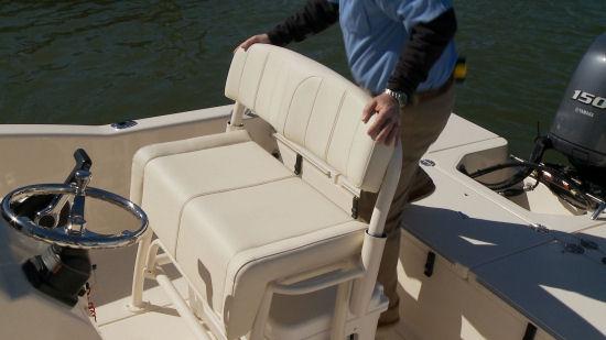 The helm seat has a removable seatback, so we can sit while facing aft and watch the lines.