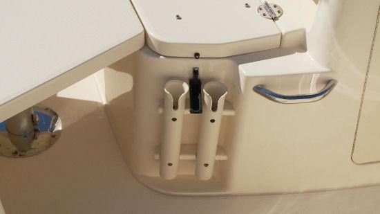 There are four vertical rod holders at the bow, two to either side of the forward console seat.