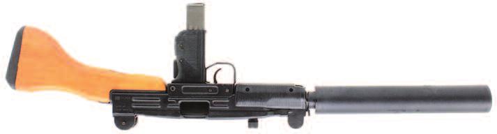 IMI/Action Arms UZI 9mm Class III sub-machine gun, pre May 86 dealer sample features a detachable wood stock, 25 round magazine, and gold and blue cordura carry case.