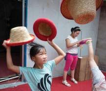 In addition to acrobatics classes, students also take general education classes. This student is practicing Straw Hat Juggling.