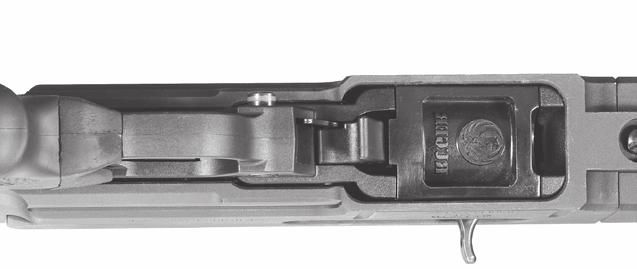 OPERATION OF SAFETY The RUGER SR-22 RIFLE has a cross-button safety which is located in the forward portion of the trigger guard (See Figure 1, p. 7.