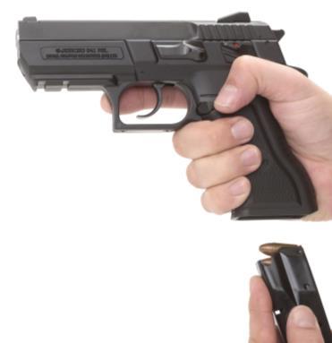 Cocking the Pistol 1. Insert the magazine into the pistol (Fig. 9). 2. Verify the safety is in the "FIRE" position. 3. Pull the slide all the way back and release it instantly (Fig. 10).
