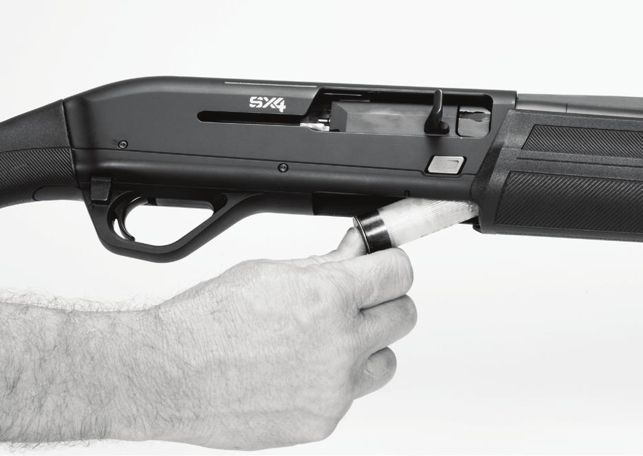 FIGURE 13 5. Reinstall the gas piston, barrel, forearm and magazine cap. Loading Push the shell completely into the magazine.