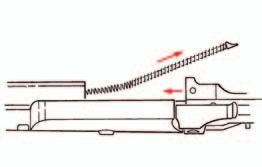 3. Invert the rifle and use a 1/4 diameter steel rod, punch, screwdriver shank, or other suitable instrument inserted into the hole in the rear of the trigger guard as a lever to spring open the