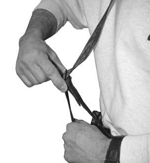 If you have the SOP FastBack, always pick the harness up by the black tether strap to keep it tangle free. Step 1 Figure 2 Step 12 Part 1. Putting on the Harness: Step 1.