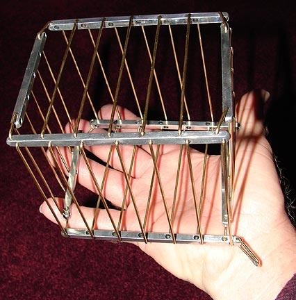 During the span of time in which I made these cages, I experimented with every aspect of the construction from the recess depth for the fine bar ends to the type of metals used.