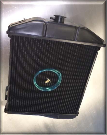 Up rated radiator Newly manufactured with thicker core to cure overheating problems.