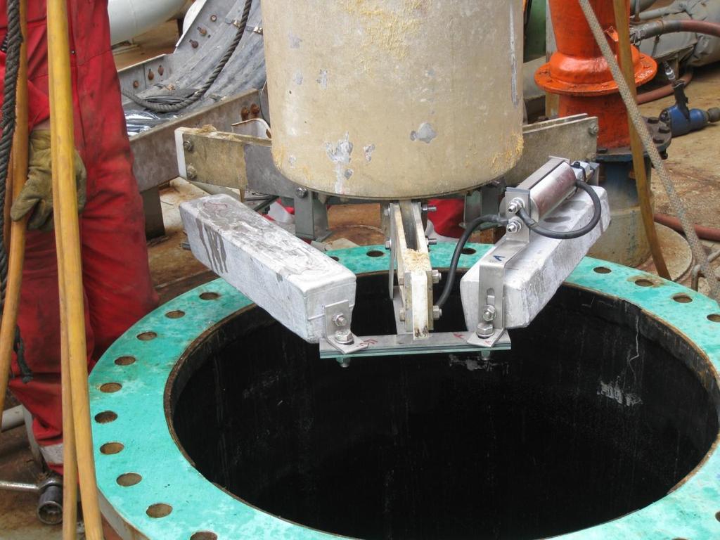 Nylon centralizers. Figure 7: Tank anodes below the pump motor.