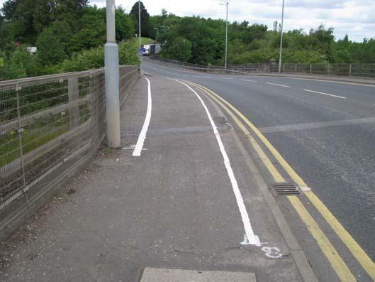APPENDIX A: Examples of low parapets on cycle routes St.Asaph Business Park junction on the A55(T) in N Wales, carrying a local cycle route.