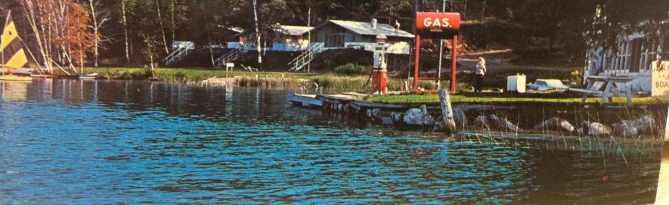 over the world. Camp Knollslea was established in 1928 in the southeast corner of the lake, operating through 1946. In 1940, John S.