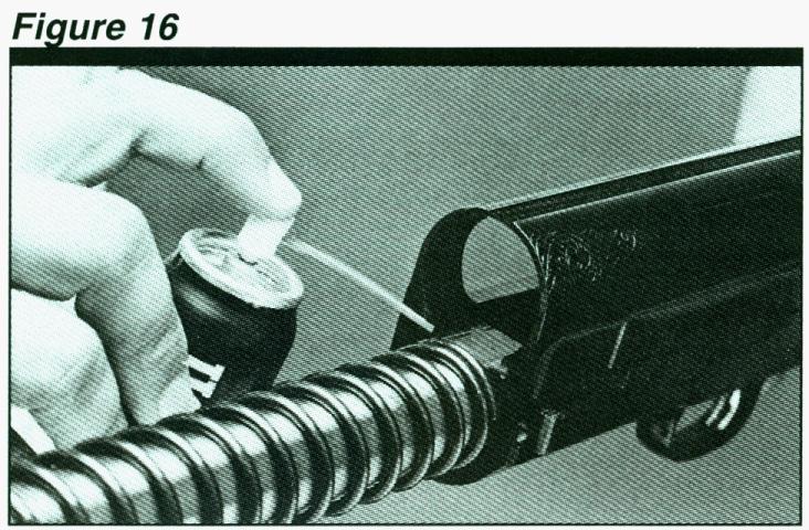 CLEANING YOUR AUTO-5 The correct procedure for cleaning your Auto-5 shotgun is as follows: VERTICAL ADJUSTMENT Adjustment of the sight is controlled by the screw located on top of the sight, To RAISE