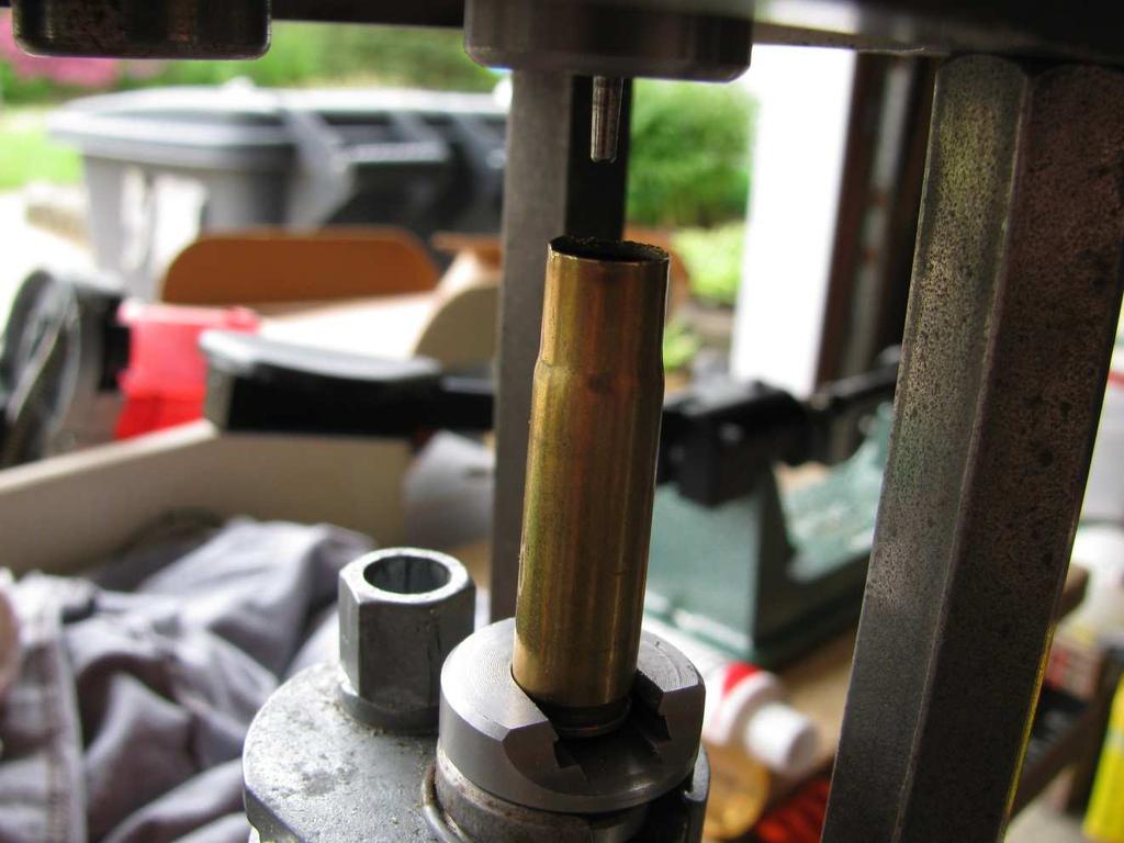 3) De-prime and size the brass using the Lee de-capping/sizing die and a bit of Lee Resizing Lube: Figure