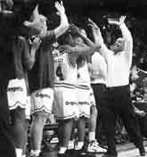 Cougar History Kelvin Sampson celebrates a win over USC. Bennett was a perfect fit for a struggling WSU program.