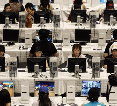 Participants battling it out in a video game competition in Seoul in 007.