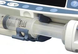 This is correct if the syringe remains in position before the syringe clamp is closed. 4. Lift the syringe clamp until it locks against the syringe barrel. 5. 6.