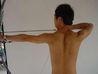 The position of the string and the direction of arrow flight will be different if the bow is canted at the time of aiming and loosing.