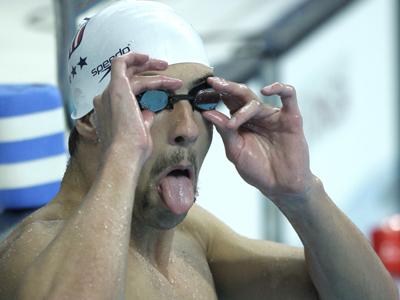 The victory kept Phelps on pace to win a record eight gold medals. Phelps also qualified for the 200-meter freestyle final and 200 butterfly semifinal.