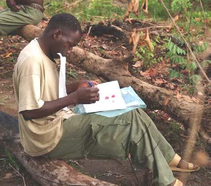Plate 13: Survey team member noting indictor bird species Table 5: Densities of key water-birds and indicator species observed during the surveys of the Ruvuma and Lugenda Rivers in 2006.