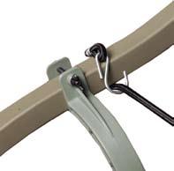 Wrap the supplied bungee cord around one side of the curved platform upright bars and push the S-hook through the loop as shown in