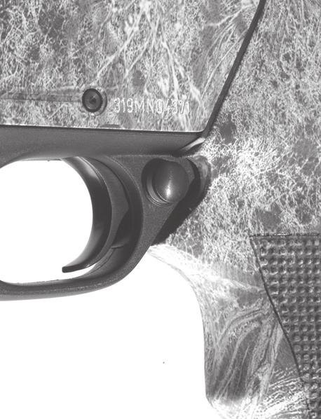 FIGURE 3 FIGURE 4 gunsmith. When installed, the left-handed safety will have the safety button s red warning band on the right side of the trigger guard. The safety in the on safe position.