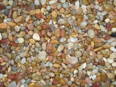 BAGGED ROCK SUNSET PEBBLE Dry wet This decorative pebble is sure to brighten up any outdoor area with its sunny