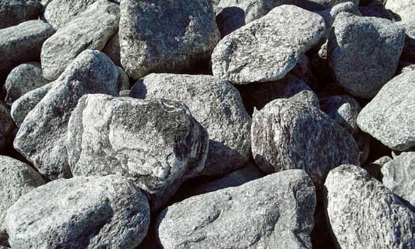 COBBLE Glacier Granite [this material is in baskets] Glacier Granite is a water worn granite.