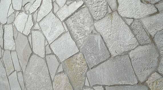 FLAGSTONE Silver Quartzite Flagstone Silver quartzite is a light shade of silver with some slightly darker gray bands and occasional gold streaks. This stone is extremely dense and easy to maintain.