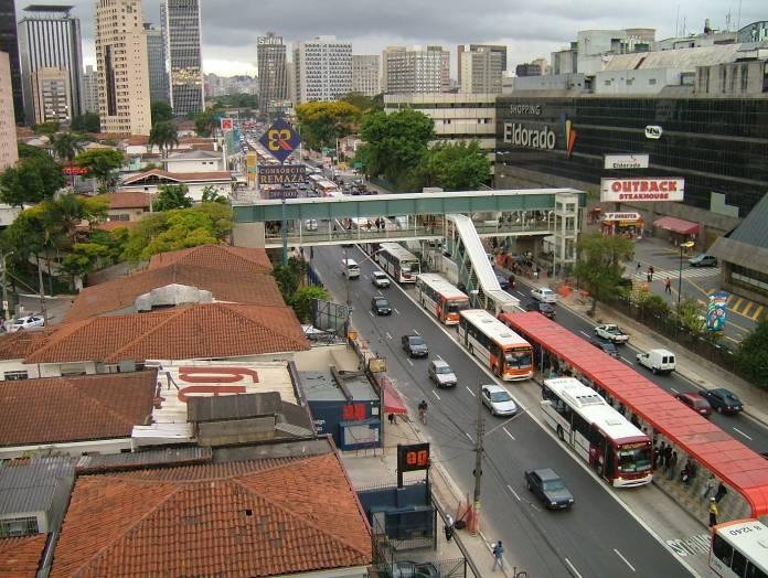 Bus speeds are slow because buses cue at the station OR the intersection Sao Paulo only 12kph because of