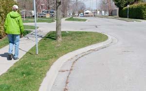installing sidewalk extensions or similar structures at intersections and crosswalks.