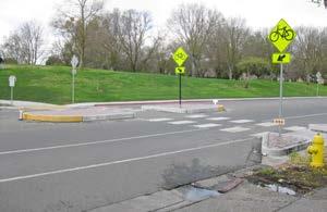 Raised islands are typically used on heavily traveled streets and/or multi-lane streets. They are placed in the center of the street at intersections or mid-block.