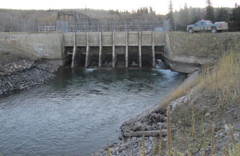 Mary Diversion headworks structure (view of from downstream of the headworks, flow is towards reader) Recent examinations of the 100-year-old diversion dam, headworks, and canal