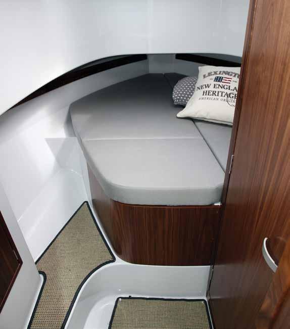 A nicely crafted piece of wood locks over the door handle, it s The aft cabin delivers a good sized berth, but with limited headroom 72 November 2014 simple, elegant and practical.