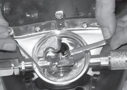 Using a torque wrench with a flat blade screwdriver adapter, carefully torque these screws to 12 inch pounds. 20) Adjust the regulator following instructions in Section 6.