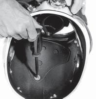 Allow silicone to cure for a minimum of 24 hours before using helmet. 3) Position the handle (93) and run in the front screws (94) only until snug.