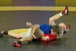 2.9 DANGER POSITION CONTROL KEY POINTS: Offensive wrestler lifts opponent s head, while making pressure down to the chest.