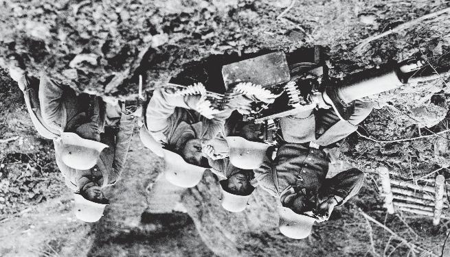 A German machine gun crew manning their Maxim gun. Image: Imperial War Musuem Men made the best of a bad situation.