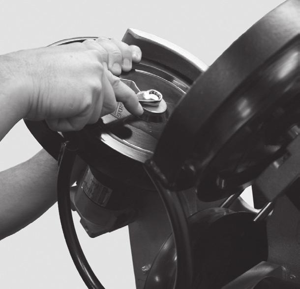 Test the wheel by spinning it by hand and making sure that it spins freely without wobble before turning the unit ON. e. Be sure the wheel guard is properly and securely reinstalled.