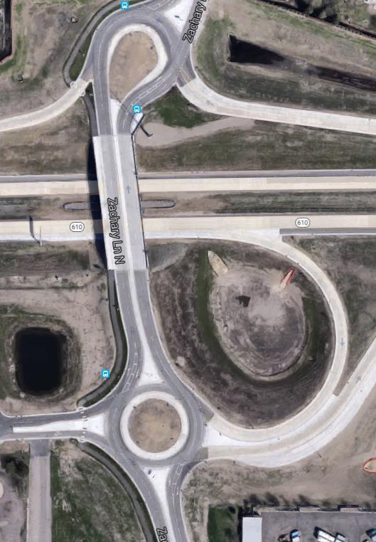 3.16.6 Roundabout Terminals This interchange uses roundabouts as the ramp terminals intersection control. See Figure 27: An interchange that uses roundabouts as the ramp terminals.