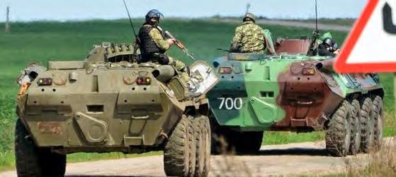 On its right there is another BTR-80 sporting a much more recent pattern. Here we can see the difference between green A.MIG-052 DEEP GREEN, another non-identified lighter green and A.