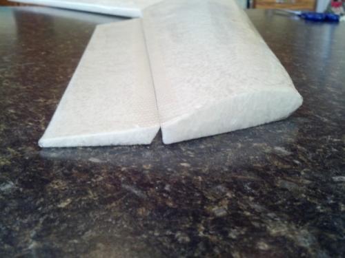 Use your iron to stick the laminate to the foam.