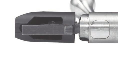aligned with the center of the bolt handle base. (See Figure 8b.