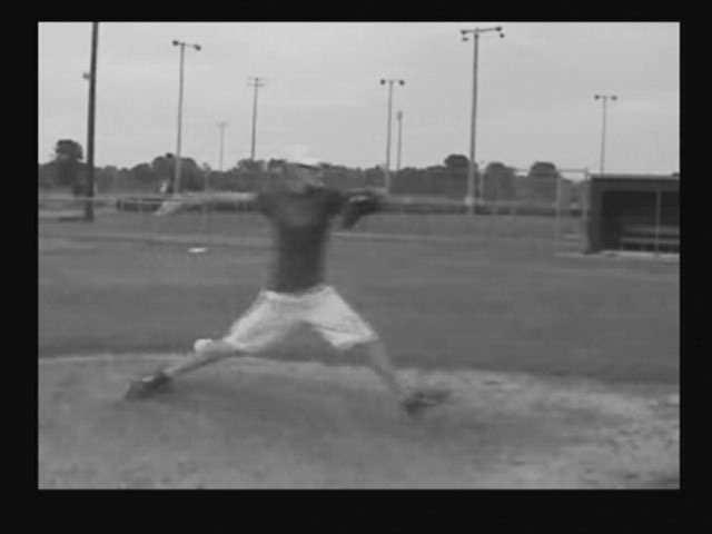 The pitcher starts with his feet spread apart. His head will be positioned back but not over his back leg. His lead foot will be either in line with his front shoulder or out ahead of it slightly.