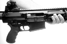 LOADING RIFLE AND FIRING THIS FIREARM MAY DISCHARGE ACCIDENTALLY WHEN A ROUND IS FED INTO THE CHAMBER.