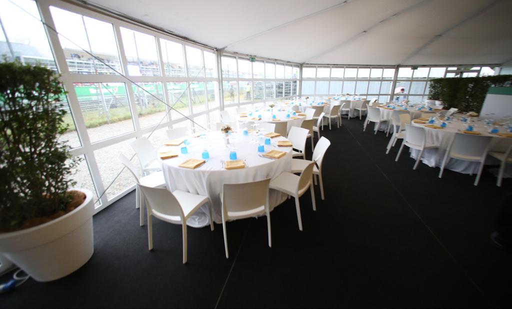TICKET TO CENTRALE GRANDSTAND Covered Seating SATURDAY & SUNDAY PREMIUM HOSPITALITY IN THE CHAMPIONS CLUB Premium Race Views of the Main Straight Premium Open Bar Including Mixed Drinks, Beer, Wine,