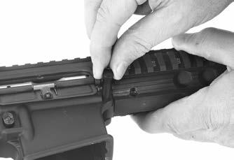 (It is best to hold the upper and lower receivers together until you are ready to remove the upper receiver.) Figure 18 c. Lift the upper receiver off the lower receiver to do any additional cleaning.