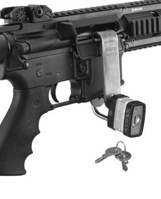 4. For SR-556 rifles, apply the lock by placing the clamp into the ejector port and through the magazine well as shown in Figure 2a.