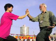 I had learned the basic movement in the partners form that Master Peng and I used to do.